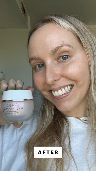 Image may contain Head Person Face Body Part Finger Hand Adult Cosmetics Happy Smile Bottle Perfume and Makeup